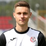 M. Szela