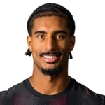 L. Badé